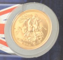 A 2003 Elizabeth II Coronation anniversary half sovereign, in cardboard presentation