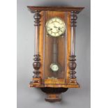 A Vienna style chiming regulator with 12cm celluloid dial, Roman numerals, grid iron pendulum