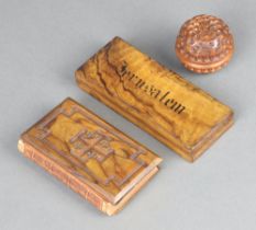 A rectangular olive wood 4 division stamp box, the lid marked Jerusalem 2cm x 12cm x 5cm (missing