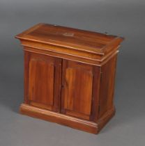 A Victorian mahogany collector's cabinet with moulded cornice, interior fitted recess above 4