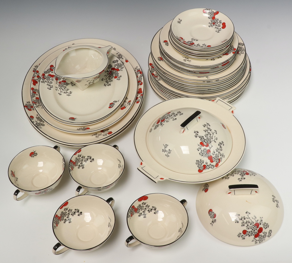 A 41 piece Royal Doulton Carnival pattern dinner service comprising twin handled tureen (some