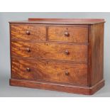 A Victorian mahogany D shaped chest of 2 short and 2 long drawers and raised back 94cm h x 126cm w x