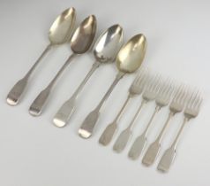 Four George III silver fiddle pattern table spoons London 1816, monogrammed, together with 5