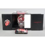 A Rolling Stones crystal head display case containing skull head decanter of vodka, Rolling Stones