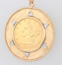 An American 1883 5 dollar coin set in a yellow metal mount marked 14k and set white stones, gross