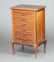 An Edwardian inlaid mahogany sheet music chest of 6 drawers with gilt swan neck drop handles, raised