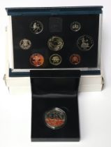 A 2016 five pound Somme coin, together with 3 cased proof sets 1995, 1996 and 1997