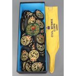 Two Civil Defence Corps arm bands and a large collection of Civil Defence Corps cloth badges