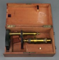 Nachet and Fils Paris, a student's 19th Century single pillar microscope, boxed Bottom to box is
