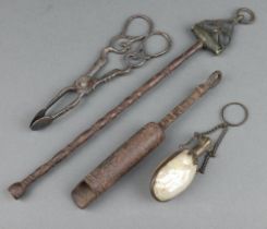 A pair of 18th Century polished steel sugar nips, a steel and brass tamper and 1 other item