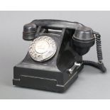 A black Bakelite internal telephone, base marked N1049H35T