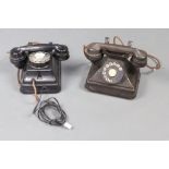 A Siemens Brothers black Bakelite wall telephone, together with a black Bakelite dial telephone (