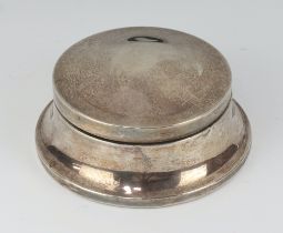 A circular silver dressing table trinket box with domed lid and waisted form, Birmingham 1925 4cm