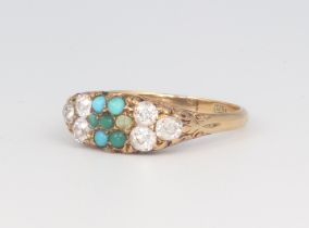 An 18ct yellow gold dress ring set turquoise and 6 diamonds to the shoulders (1 turquoise broken),