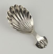 A Britannia standard silver scallop shaped caddy spoon Birmingham 1911, maker Levi and Salaman, 16