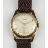 A gentleman's Tissot wristwatch contained in a 9ct gold case, with original box