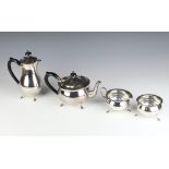 A stylish silver plated ebony mounted tea and coffee set on pad feet