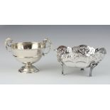 A silver twin handled trophy cup London 1911 together with a circular silver bowl with pierced