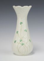 A Belleek club shaped vase decorated clover, the base with green mark 26cm