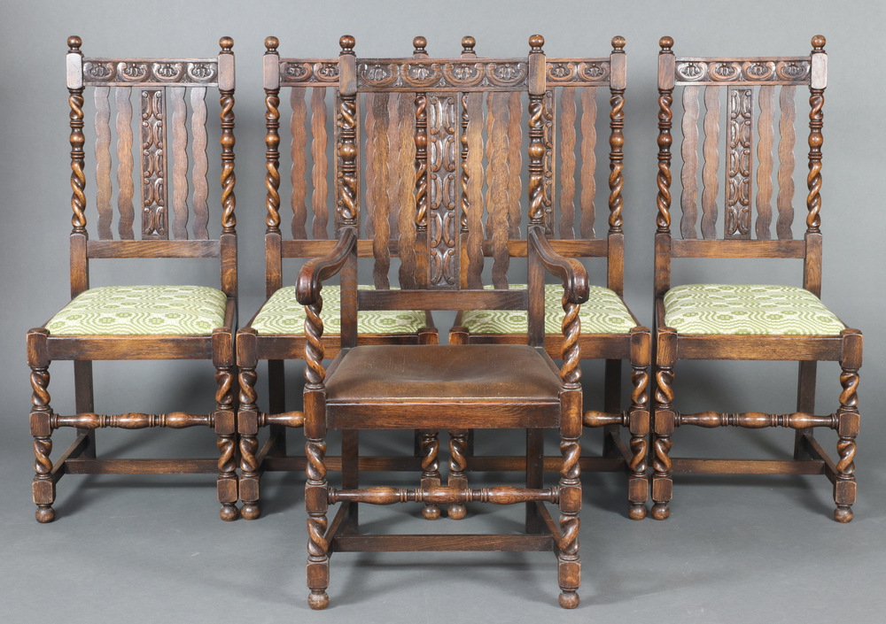 A set of 5 1920's stick and rail back dining chairs with spiral turned columns to the sides