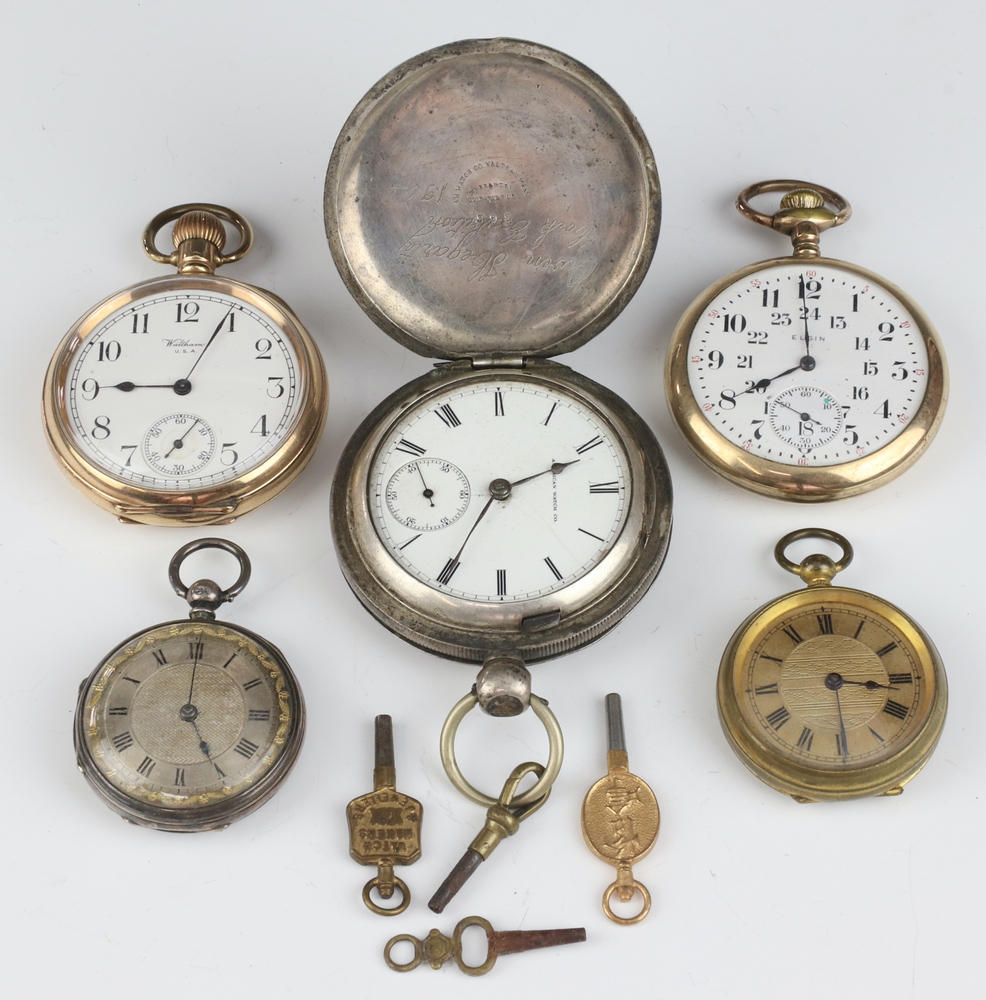 A Waltham keyless pocket watch contained in a gold plated case, a Waltham key wind pocket watch in a