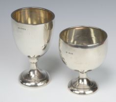 A silver goblet London 1923 by Garrards together with 1 other silver goblet Sheffield 1934 by Walker