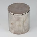 A modern silver cylindrical trinket box in the form of a tin, London 1991, maker C J Vander Ltd.,