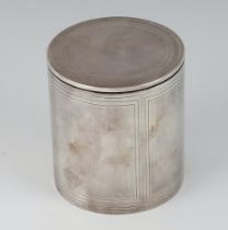 A modern silver cylindrical trinket box in the form of a tin, London 1991, maker C J Vander Ltd.,