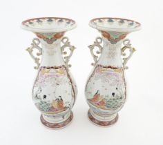 A pair of Japanese vases with flared rim and twin handles, decorated with a vignette depicting