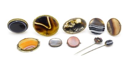 A quantity of assorted Victorian and later brooches, stick pins, etc. set with various hardstone