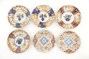 Six assorted Japanese plates with scalloped edges decorated in the Imari palette with flowers and