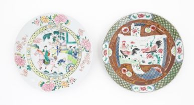 Two Chinese famille rose plates / dishes, one depicting a landscape scene with a figure on horse