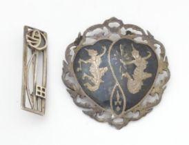 A silver brooch inspired by the designs of Charles Rennie Macintosh, together with a brooch marked