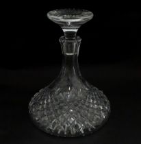 A cut glass ships decanter. Approx. 9 3/4" high Please Note - we do not make reference to the