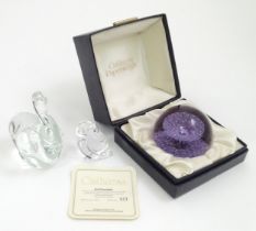 A limited edition Caithness paperweight titled Ice Fountain, no. 521 / 1500, boxed with certificate.