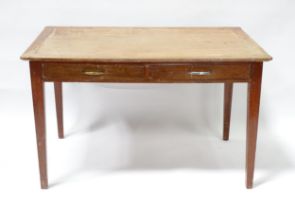 A early 20thC office desk with four tapering legs. Produced by Cooke's of Finsbury. 48" wide x 30"