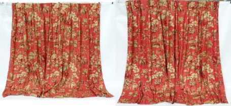 A pair of full length lined curtains in Andrew Martin Botanist Red with a triple pinch pleat