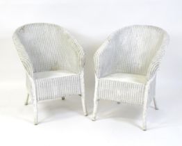 A pair of early / mid 20thC Lloyd loom chairs. 24" wide x 23" deep x 31" high. Please Note - we do