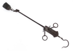 A 20thC balance beam / bar hanging scale with hook and weight. Approx. 14 1/2" long Please Note - we