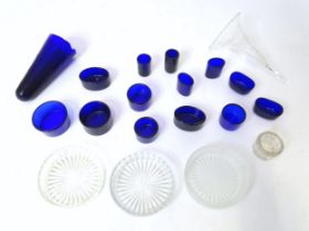 A quantity of assorted blue glass liners, clear glass butter dish liners, epergne flute, etc. Please