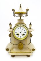 A late 19thC French alabaster mantle clock by Japy Freres et Cie the case decorated with lion