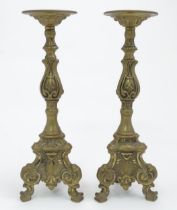 A pair of cast candlesticks with scrolling detail. Approx. 12" high (2) Please Note - we do not make