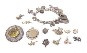 Assorted silver and white metal to include charms, pendant, brooch etc. Please Note - we do not make