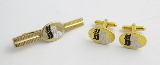 A novelty advertising tie pin and cufflinks for Black & White whisky, with dog detail. Please Note -