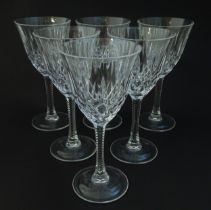 A set of 6 cut crystal wine glasses Approx 7 1/4" high (6) Please Note - we do not make reference to