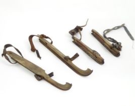 Two pairs of vintage wooden ice skates Please Note - we do not make reference to the condition of