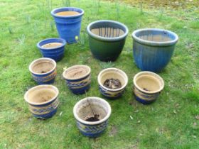 Eight assorted blue glazed ceramic planters and plant pots, the largest 13 1/2" tall (8) Please Note