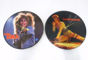 Two wall clocks converted from picture disk LPs / vinyl records, comprising titles by David Bowie