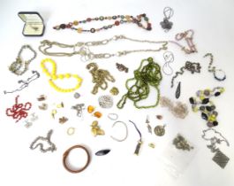 A quantity of assorted costume jewellery to include bead necklaces, cufflinks, bracelets, brooches