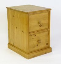 A late 20thC pine filing cabinet. 28" wide x 22" deep x 32" high. Please Note - we do not make